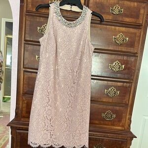 Elegant Pink Lace Dress with Embellished Neckline